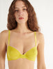 a model in the araks organic cotton sofia underwire bra in electric