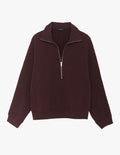 A flat lay image of the Araks Vivienne zip-up in the shade Mill, against a solid white background.