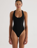 A model in the araks recycled tate one piece in black