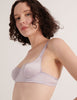 A model in the araks silk gita underwire bra in fairy lavender