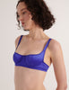 A model in the araks silk gita underwire bra in tanzanite blue