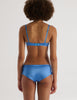 a model in the araks silk charmeuse gita underwire bra and gal hipster in bluet blue