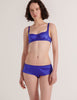 A model in the araks silk gita underwire bra and gal hipster in tanzanite blue