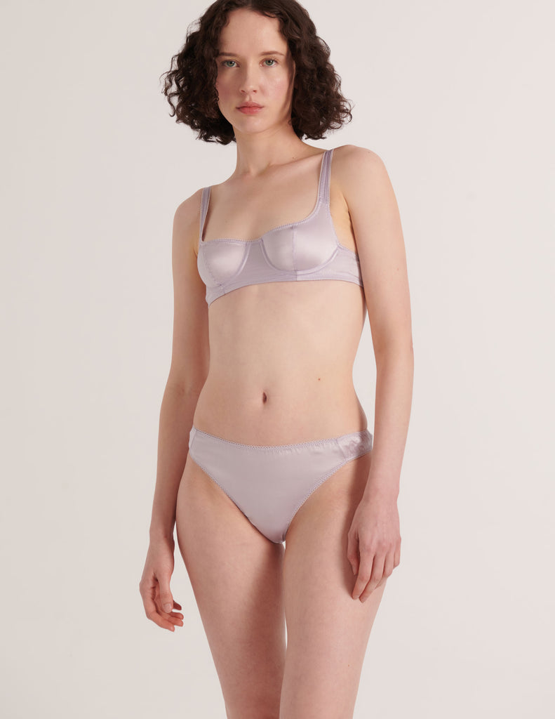 A model in the Araks silk gita underwire bra and grier thong in fairy lavender