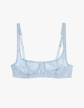 A flat lay of the araks silk gita underwire bra in glace blue