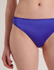 A close up of the araks silk grier thong in tanzanite blue