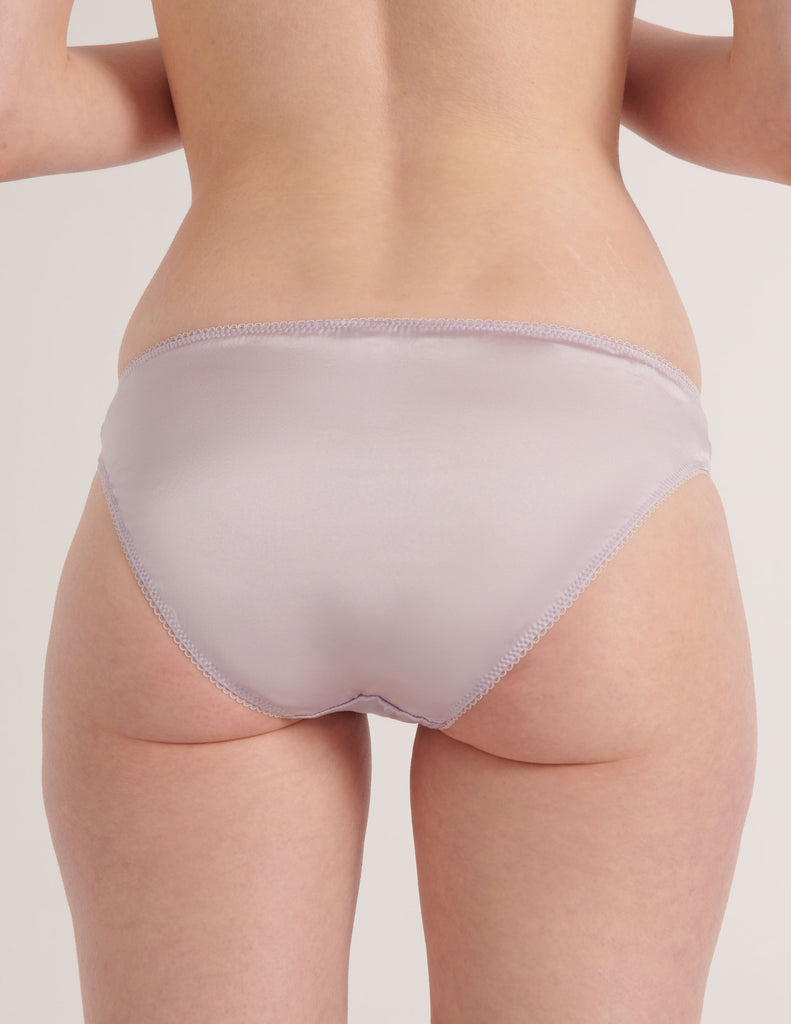 A model in the araks silk gwyneth panty in fairy lavender
