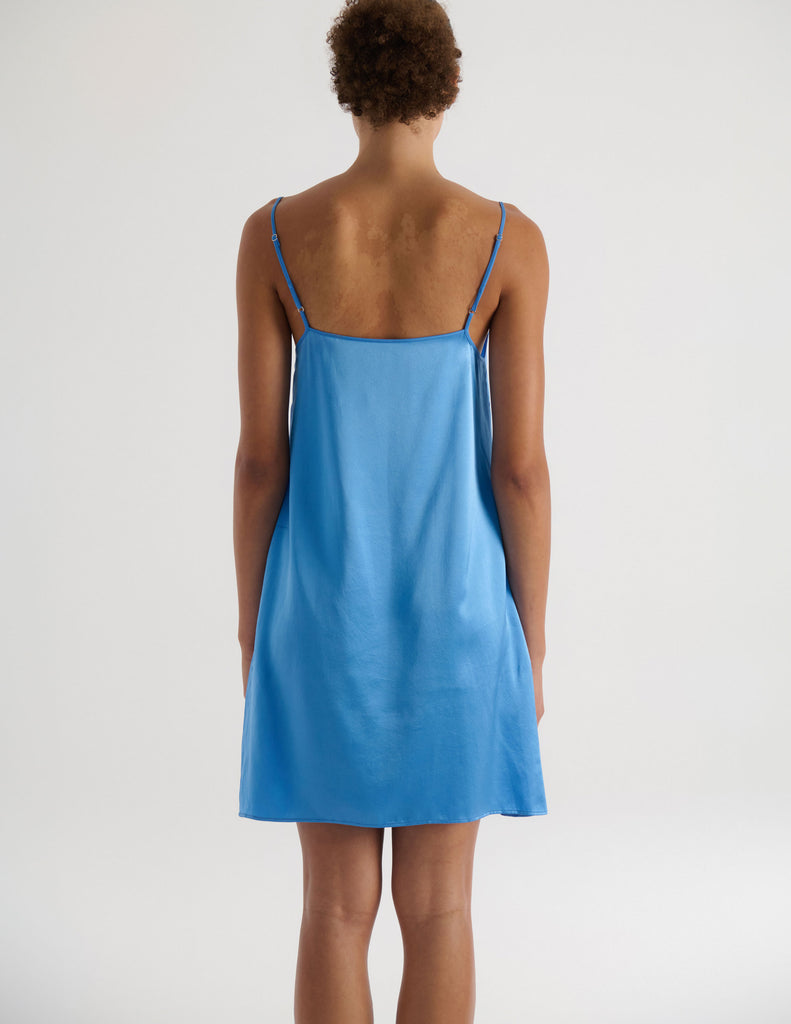 A model in the araks silk tolouse slip in bluet blue