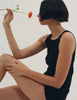 A model wearing the Araks Uki tank and Presley tank in Black
