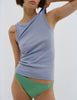 A model wearing an Araks Uki tank in Rococo and Grier thong in Cypress