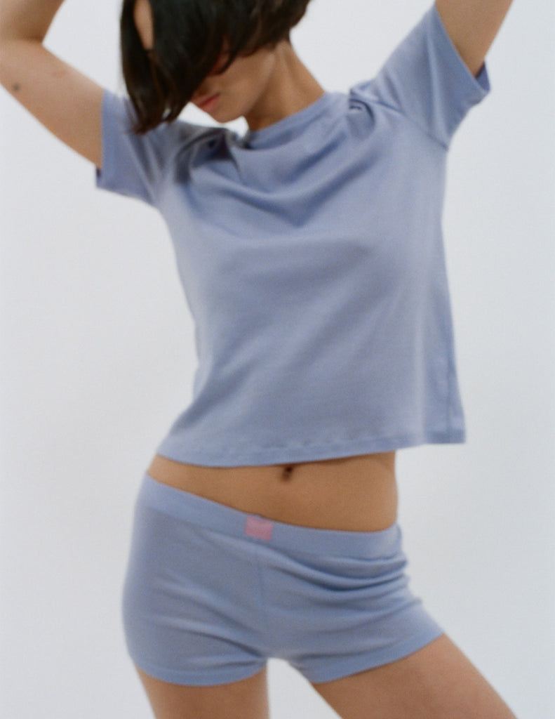 Model wearing the Araks Tavi tee and Presley short in Rococo