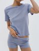 Model wearing the Araks Tavi tee and Presley short in Rococo