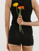 A model wearing the Araks Uki tank and Presley tank in Black