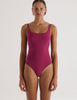 A model in the araks natalie one piece in cerise red