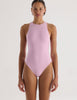 A model in the araks tolle one piece in ballet pink