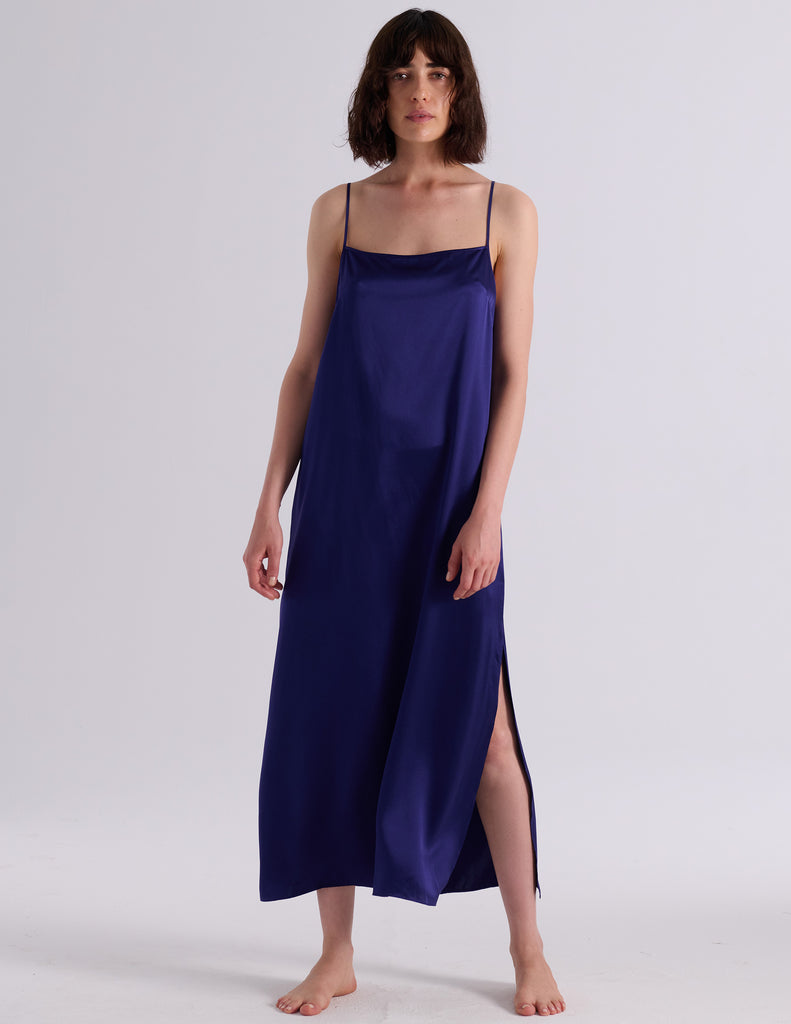Model wearing Araka vika slip dress in starling