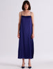 Model wearing Araka vika slip dress in starling