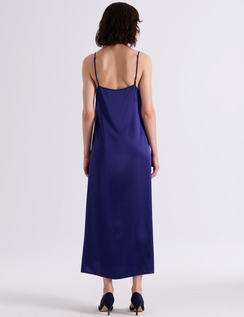 Model wearing Araka vika slip dress in starling