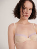 close up of Woman wearing a Araks Cream cotton Chloe bra with lavendar lace trim