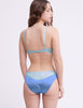 back of Woman in Blue Silk and Chiffon Bralette and panty