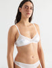 woman in white silk chiffon and charmeuse thong