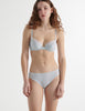 Front view of the woman wearing cloud blue cotton chloe bra with sonja panty 