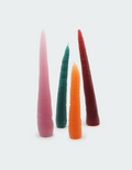 Four carrot shape candles