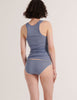 A model from the back in the araks organic cotton james tank and isabella panty in feather grey
