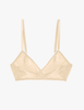 Flat image of undyed cotton bralette. The term "greige" is a blend of "grey" and "beige," the typical colors of unprocessed, natural cotton