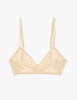 Flat image of undyed cotton bralette. The term "greige" is a blend of "grey" and "beige," the typical colors of unprocessed, natural cotton