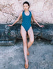 A model in the araks tate one piece in fern