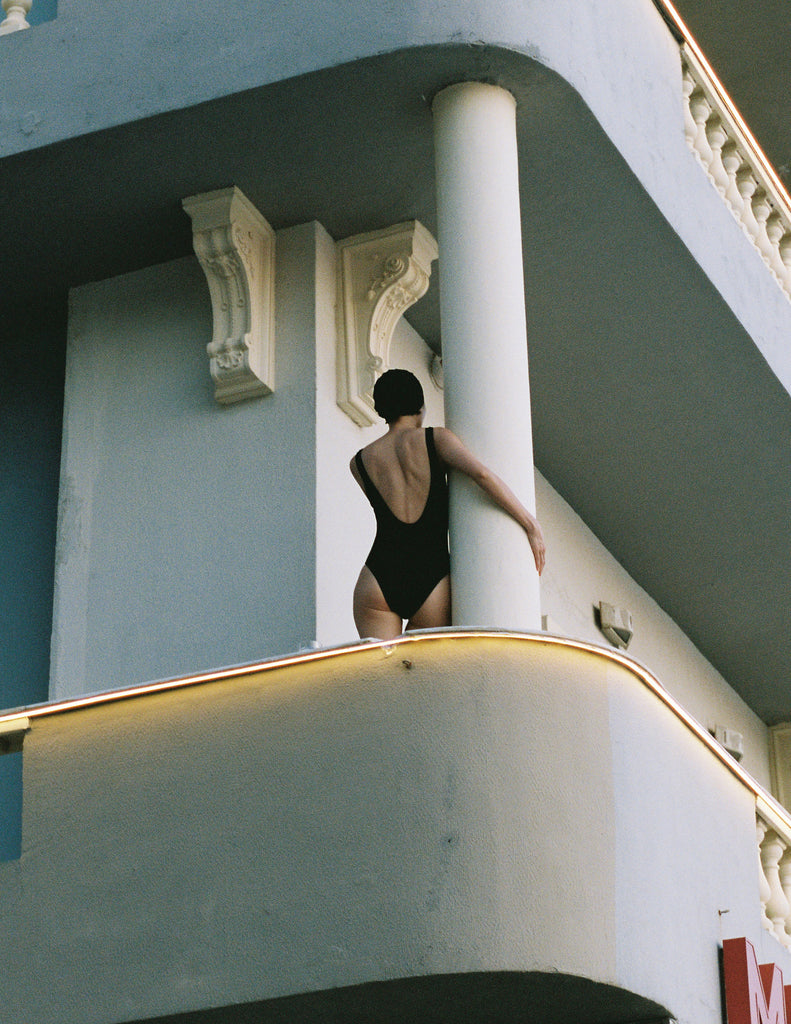 Model wearing Araks Harley one piece bathing suit in black