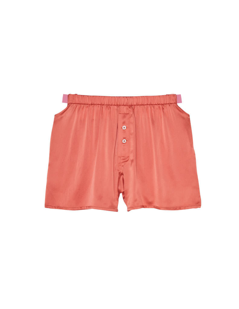 Flat of pink pajama shorts.