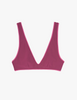 a flat lay image of the lucien bikini top in rust red brown