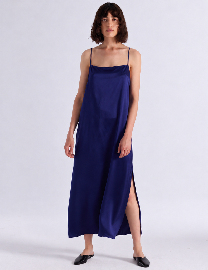 Model wearing Araks vika slip dress in starling