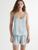 Front view of the woman wearing cloud blue parker cami silk top with eduardo boxer