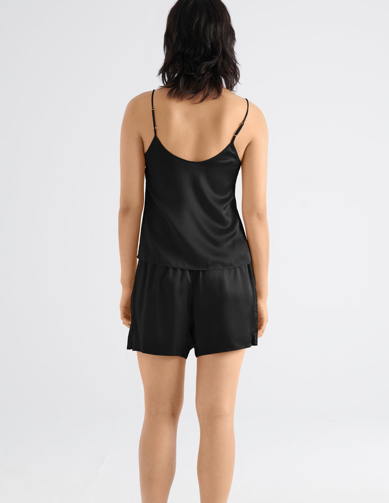 on model back shot of woman in black silk tank and cami 