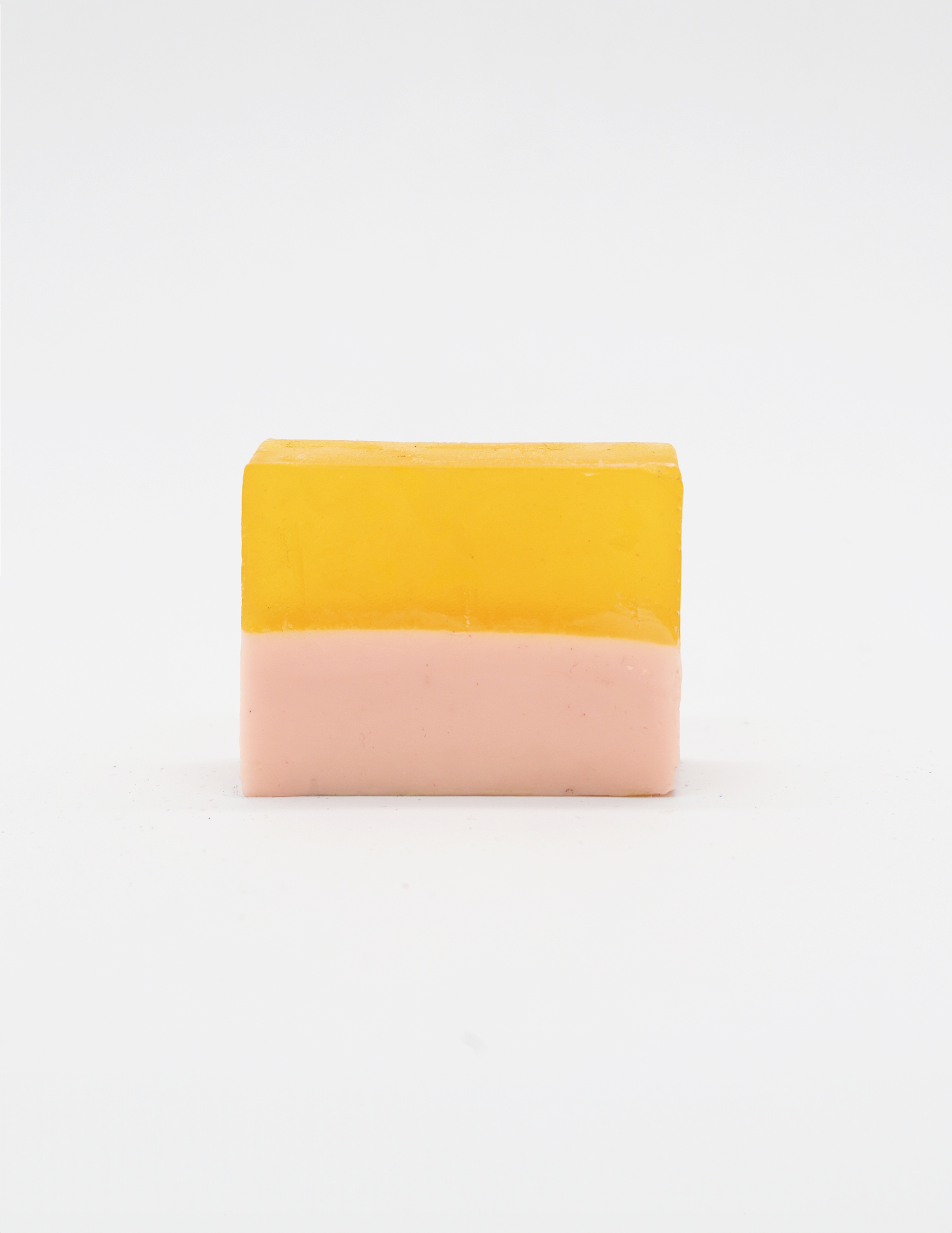 Araks handmade Two-tone yellow and pink bar of soap on a white background