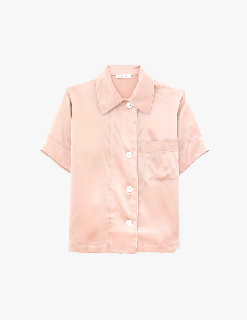 beige silk pajama top with collar and white buttons by Araks