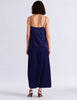 Model wearing Araks vika slip dress in starling