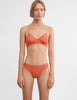 front view on model of woman in orange bra and panty