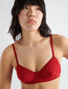 close up image of model wearing red lace bralette