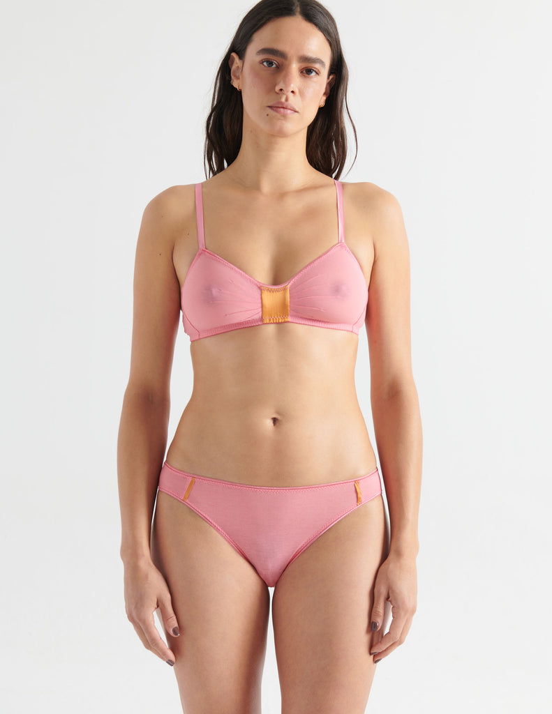 woman in pink cotton bralette and panty