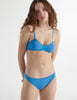 Front view of the woman wearing iris blue cotton uma bra with harriet panty