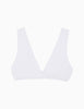 A white ribbed knit triangle bikini top with a deep V-neckline, shown flat against a solid white background.