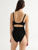 Black swimsuit with cut-out design on a white background