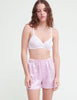 A model in the araks eduardo boxer shorts in bloom pink