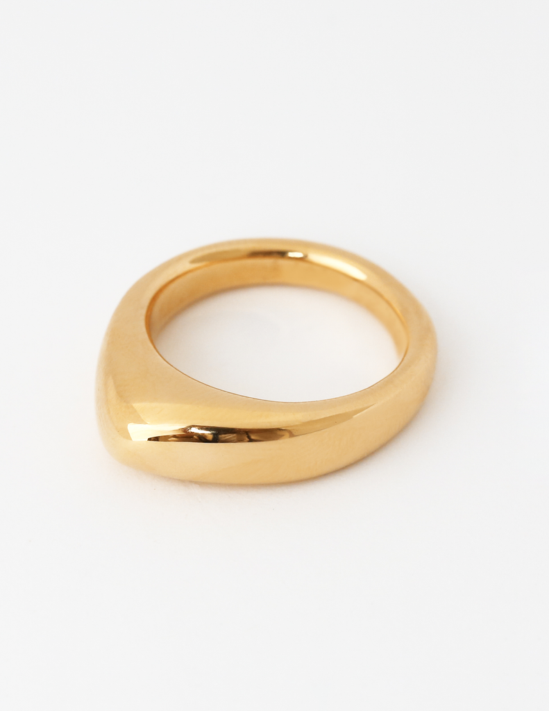 Image of solid 18k yellow large gold dome ring for weddings and milestones. Soft curves. Heavy. Not hollow.