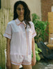 woman in pink pajama set with shorts