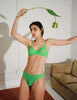 woman wearing green stretch lace bra and panty